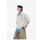 A Niche Textured Faux Two-piece Shirt With A Bold Color-block Design